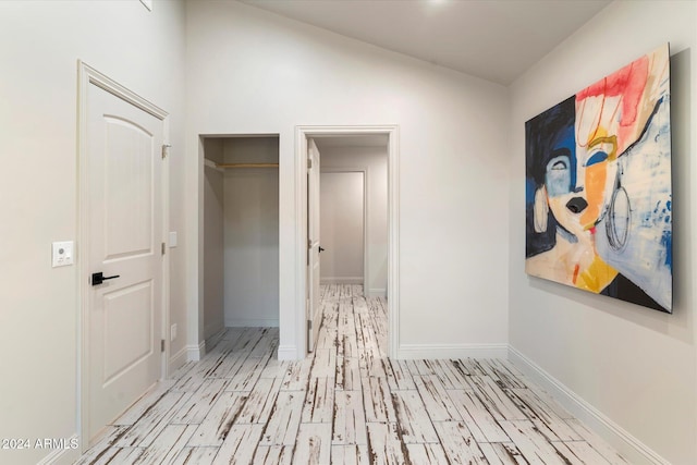 hallway featuring light wood-type flooring