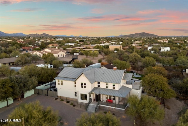 aerial view at dusk with a mountain view