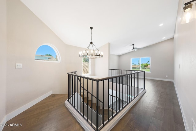 7535 W Kimberly Way, Glendale, AZ 85308 - hall with an upstairs landing, wood finished floors, vaulted ceiling, baseboards, and a chandelier