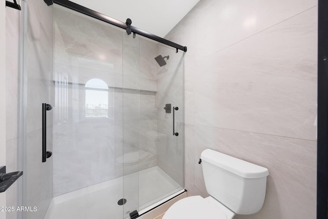 7535 W Kimberly Way, Glendale, AZ 85308 - full bath featuring toilet, a stall shower, a baseboard heating unit, and tile walls