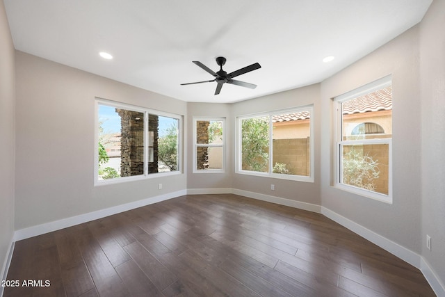 7535 W Kimberly Way, Glendale, AZ 85308 - spare room featuring ceiling fan, baseboards, dark wood finished floors, and recessed lighting