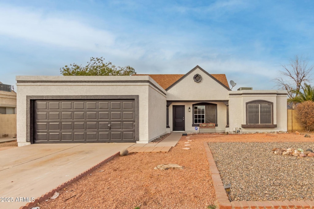 view of front of home with a garage