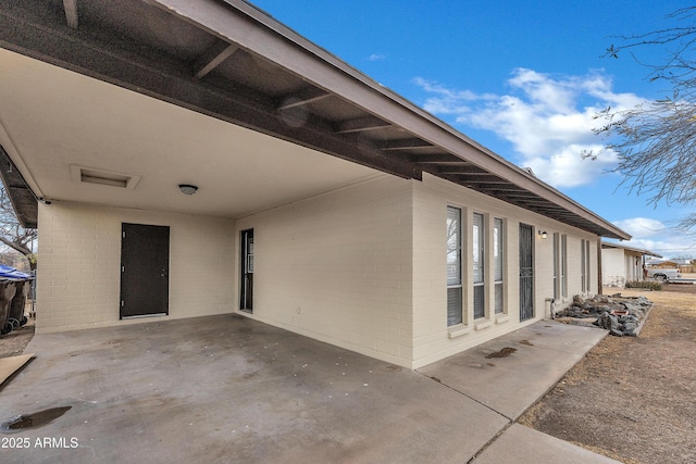 view of patio featuring a carport