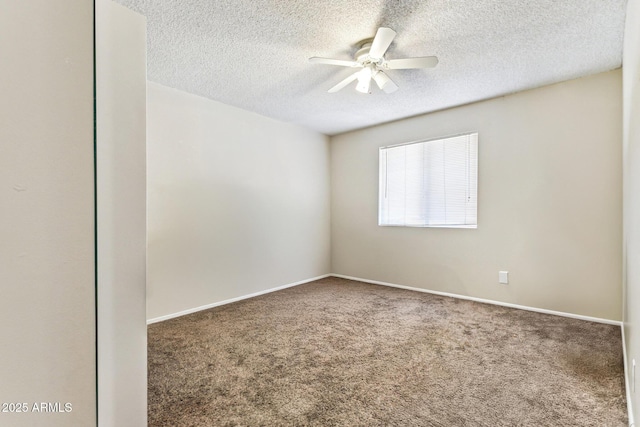 carpeted empty room featuring a textured ceiling and ceiling fan