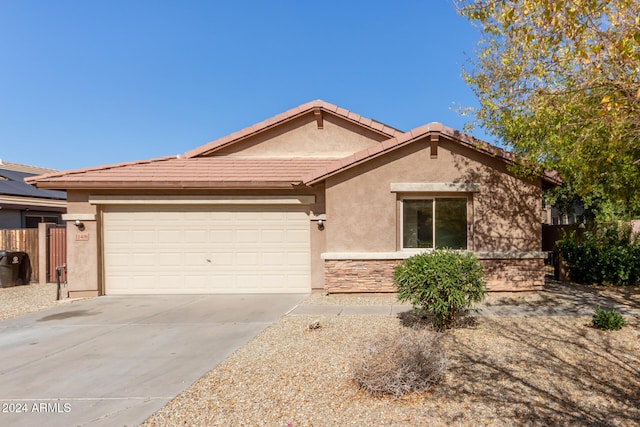 single story home with a garage