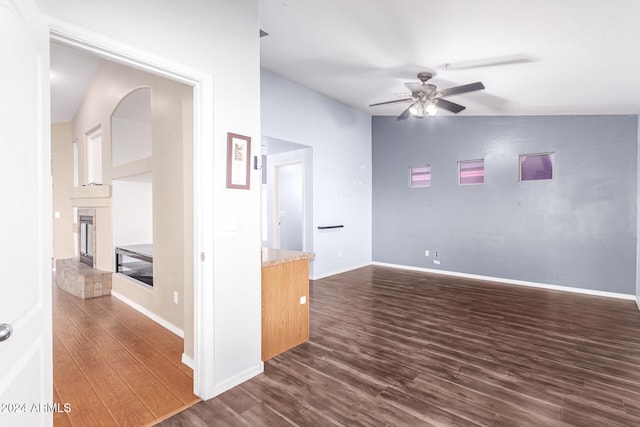 unfurnished room featuring dark hardwood / wood-style floors and ceiling fan