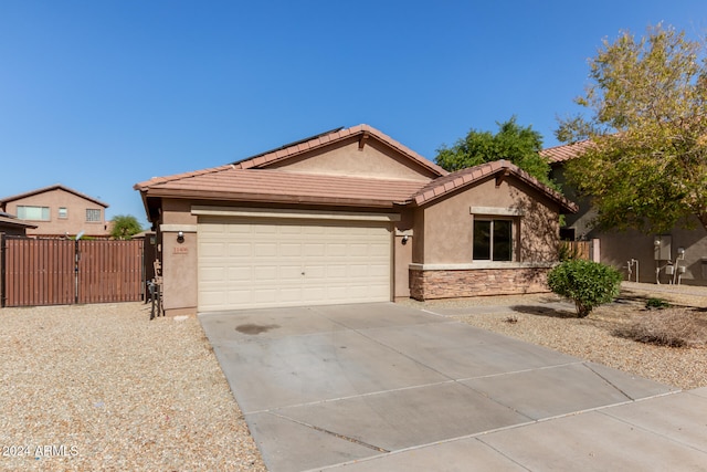 view of front of property with a garage