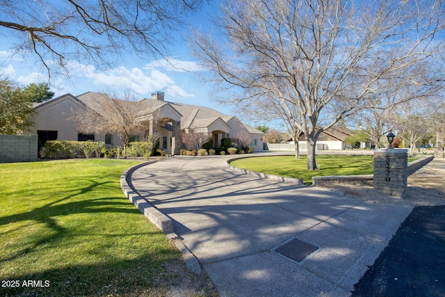 view of front facade with a front yard