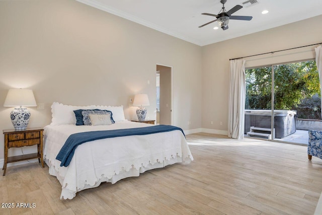 bedroom with access to exterior, light hardwood / wood-style flooring, and ceiling fan