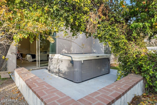 view of patio featuring a hot tub