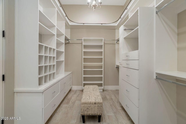 walk in closet featuring light wood-type flooring