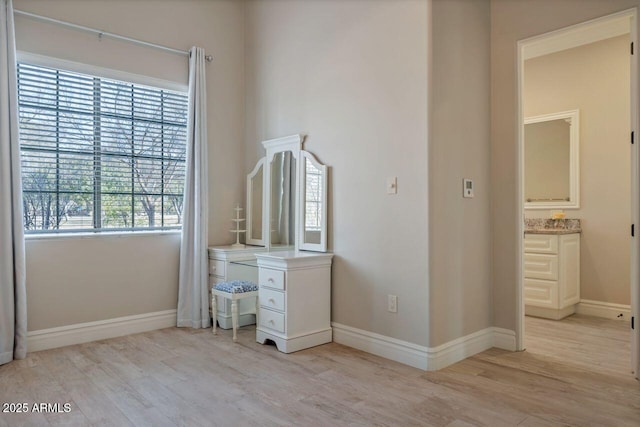 unfurnished bedroom with light wood-type flooring