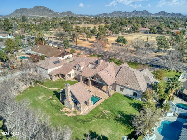 drone / aerial view featuring a mountain view