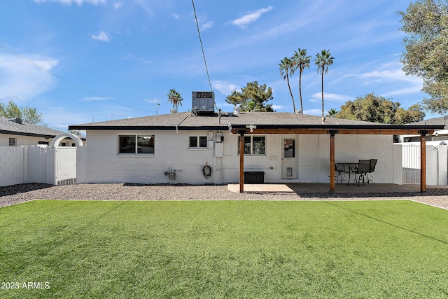 rear view of house with a patio area and central air condition unit