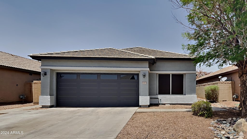 prairie-style home with a garage