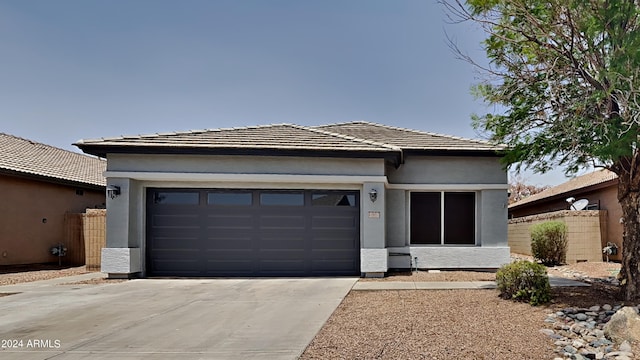 prairie-style home with a garage