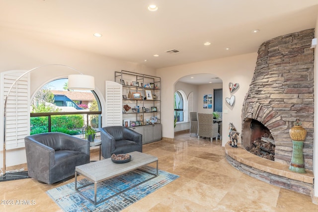 sitting room with a fireplace