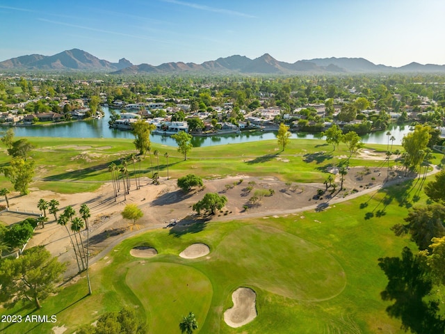 birds eye view of property featuring a water and mountain view