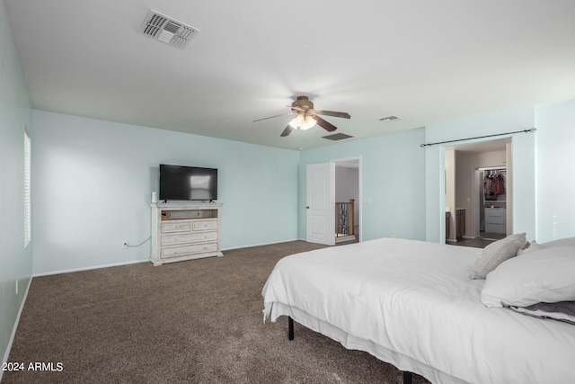 bedroom featuring dark colored carpet and ceiling fan