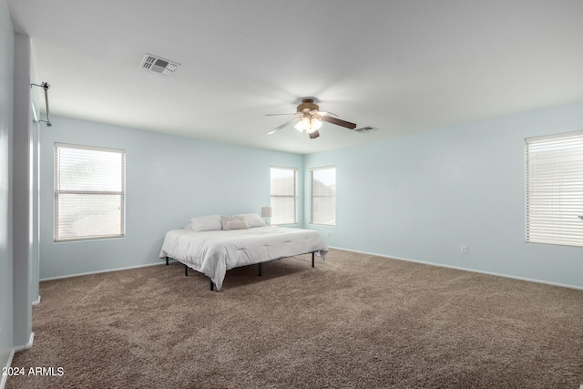 bedroom featuring ceiling fan and carpet floors