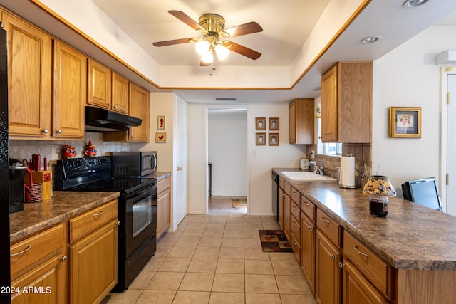 kitchen featuring ceiling fan, sink, tasteful backsplash, light tile patterned floors, and appliances with stainless steel finishes