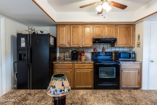 kitchen featuring backsplash, ceiling fan, dark stone counters, and black appliances