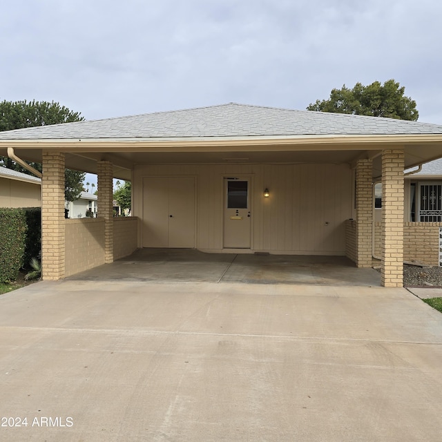 view of car parking featuring a carport