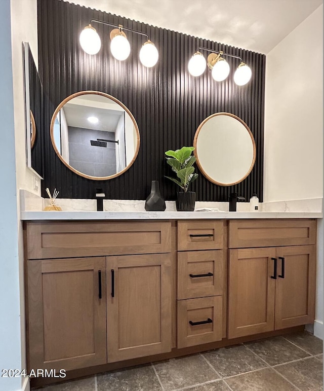 bathroom featuring a shower and vanity