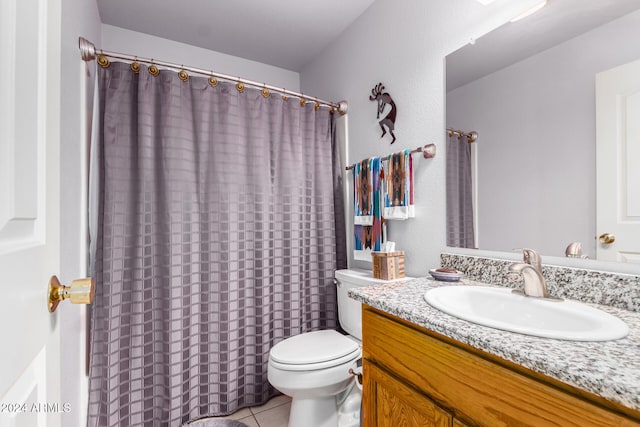 bathroom with vanity, walk in shower, toilet, and tile patterned flooring