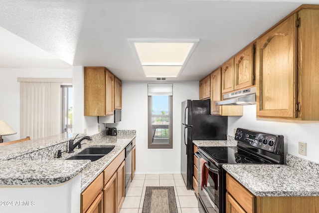 kitchen with dishwasher, kitchen peninsula, sink, light tile patterned flooring, and black range with electric stovetop