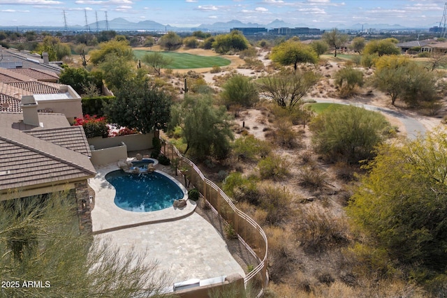 birds eye view of property featuring a mountain view