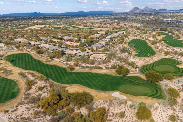 birds eye view of property featuring a mountain view