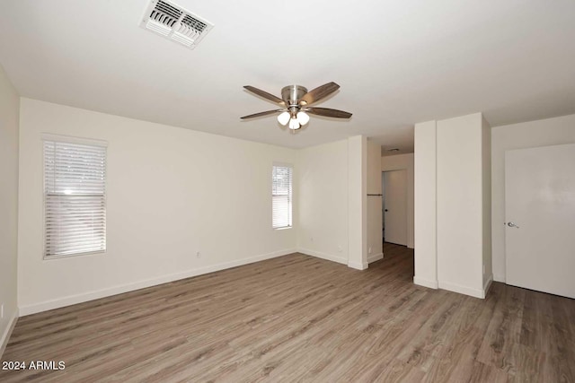 interior space with light hardwood / wood-style floors and ceiling fan