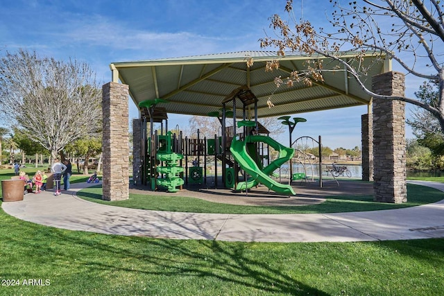 view of jungle gym with a lawn