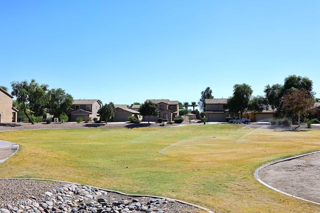 view of community featuring a yard