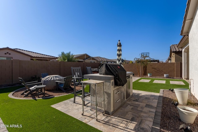 view of yard with exterior bar and a patio