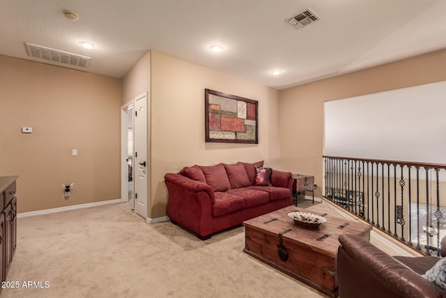 living room featuring light carpet