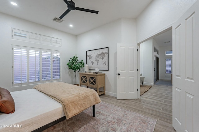 bedroom featuring ceiling fan and light wood-type flooring