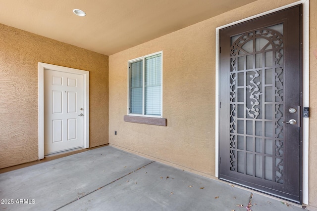 9165 W Mine Trl, Peoria, AZ 85383 - view of exterior entry featuring stucco siding
