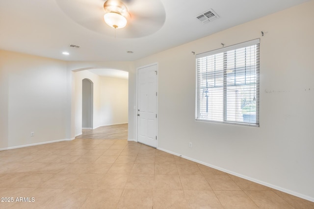 9165 W Mine Trl, Peoria, AZ 85383 - spare room with arched walkways, a ceiling fan, baseboards, and recessed lighting