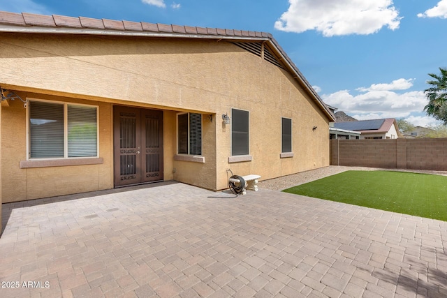 9165 W Mine Trl, Peoria, AZ 85383 - rear view of property featuring stucco siding, a patio area, and french doors