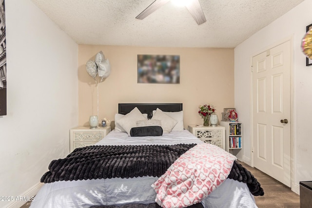 6802 S 47th St, Phoenix, AZ 85042 - bedroom featuring a textured ceiling, wood finished floors, and ceiling fan