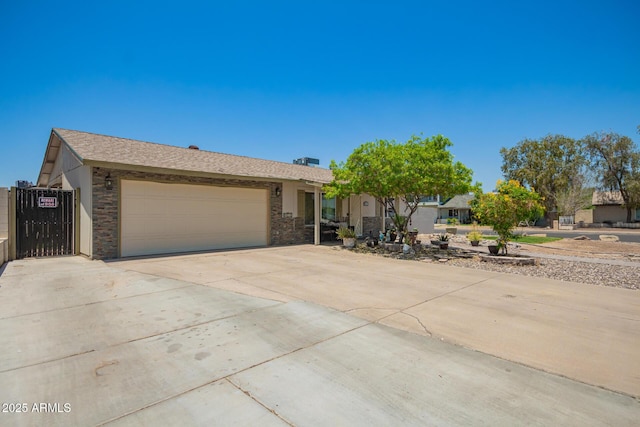 6802 S 47th St, Phoenix, AZ 85042 - view of front of property featuring an attached garage and concrete driveway