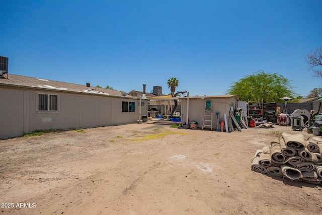 6802 S 47th St, Phoenix, AZ 85042 - rear view of property with a shed