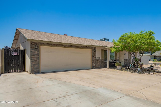 6802 S 47th St, Phoenix, AZ 85042 - ranch-style home featuring an attached garage and concrete driveway