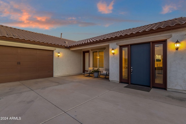 exterior space with a garage