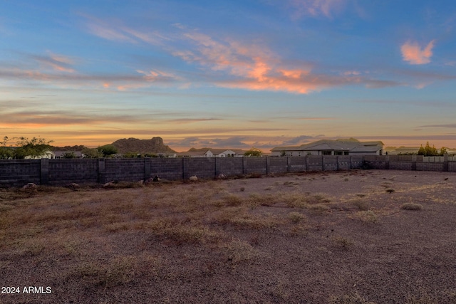 yard at dusk with a mountain view