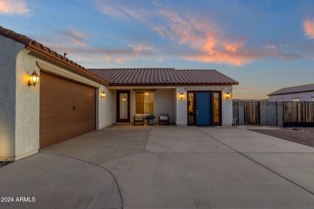 view of front of property featuring a garage