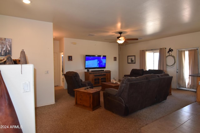 living room featuring ceiling fan