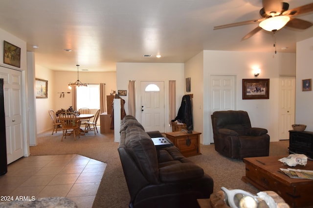 living room featuring light colored carpet and ceiling fan